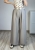 spodnie damskie wiskozowe szerokie nogawki pasek eleganckie spodnie letnie wysoki stan stylizacja casual spodnie damskie wide leg wiskoza przewiewne lekkie spodnie na lato elegancki look damski outfit