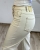 spodnie mom fit eleganckie casual spodnie kremowe modne stylizacje spodnie mom fit kobiece