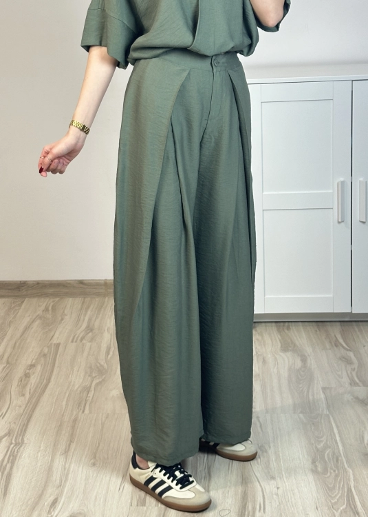 Eleganckie spodnie z szerokimi nogawkami Spodnie damskie o swobodnym kroju na sylwetce