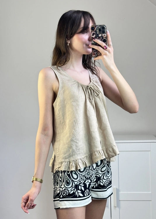 Przewiewny top damski z lnu w stylu boho. Lniana bluzka na lato z ozdobnym wiązaniem.
