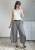 Luźne spodnie damskie culotte barrel z kieszeniami Spodnie culotte barrel w kratkę do codziennych stylizacji