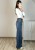 Niebieskie spodnie jeansowe wide leg z ozdobnymi przeszyciami
