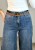 Modne jeansy wide leg z przeszyciami wzdłuż nogawek