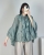 bluzka damska luźna z falbanami trendy moda koszula damska romantyczna elegancka fason koszula damska statement falbany stylizacja