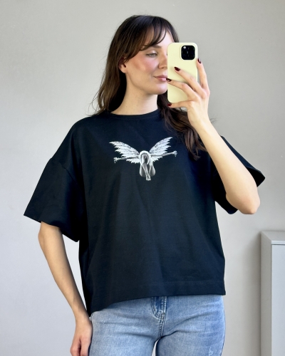 Bawełniany t-shirt luźna forma swobodny krój T-shirt oversize stylizacja codzienna jeansy