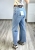 Jeansy luźniejsza nogawka dopasowana góra Jeansy jasny denim casual styl Jeansy modelujące sylwetkę kobiecy fason